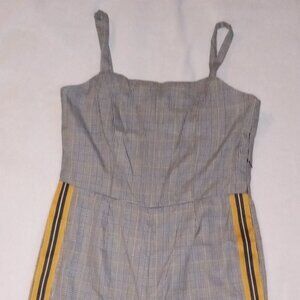 Plaid jumpsuit with stripes on the sides